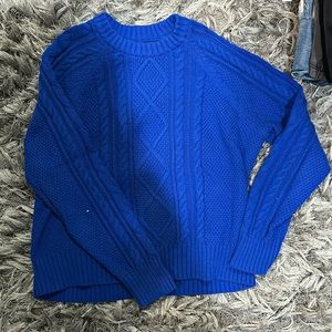 blue cable knit sweater